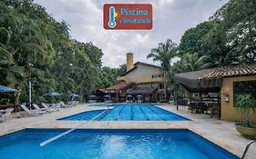 Flat 233 Riviera de São Lourenço, Bertioga Amarílis 3 piscinas climatizadas, carregador veiculo elétrico, Apartamento Duplex inteiro, cozinha equipada completa, serviço de praia final semana, limpeza e trocas diária de toalhas,